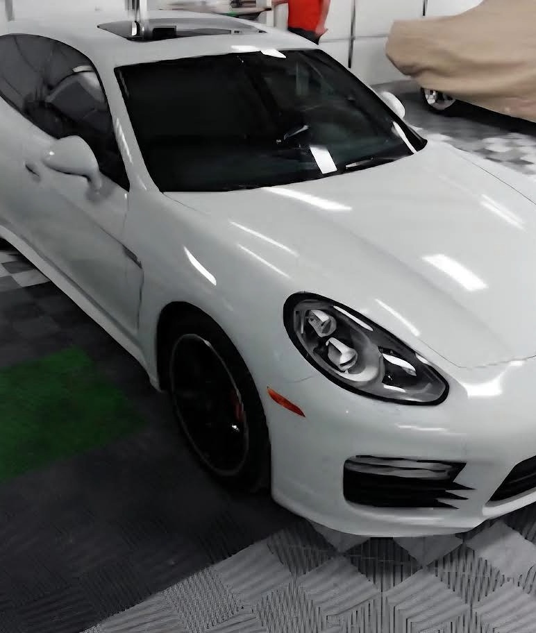 Tinted windows on a white sports car in Central Arkansas